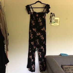Pants length romper with floral print- never worn